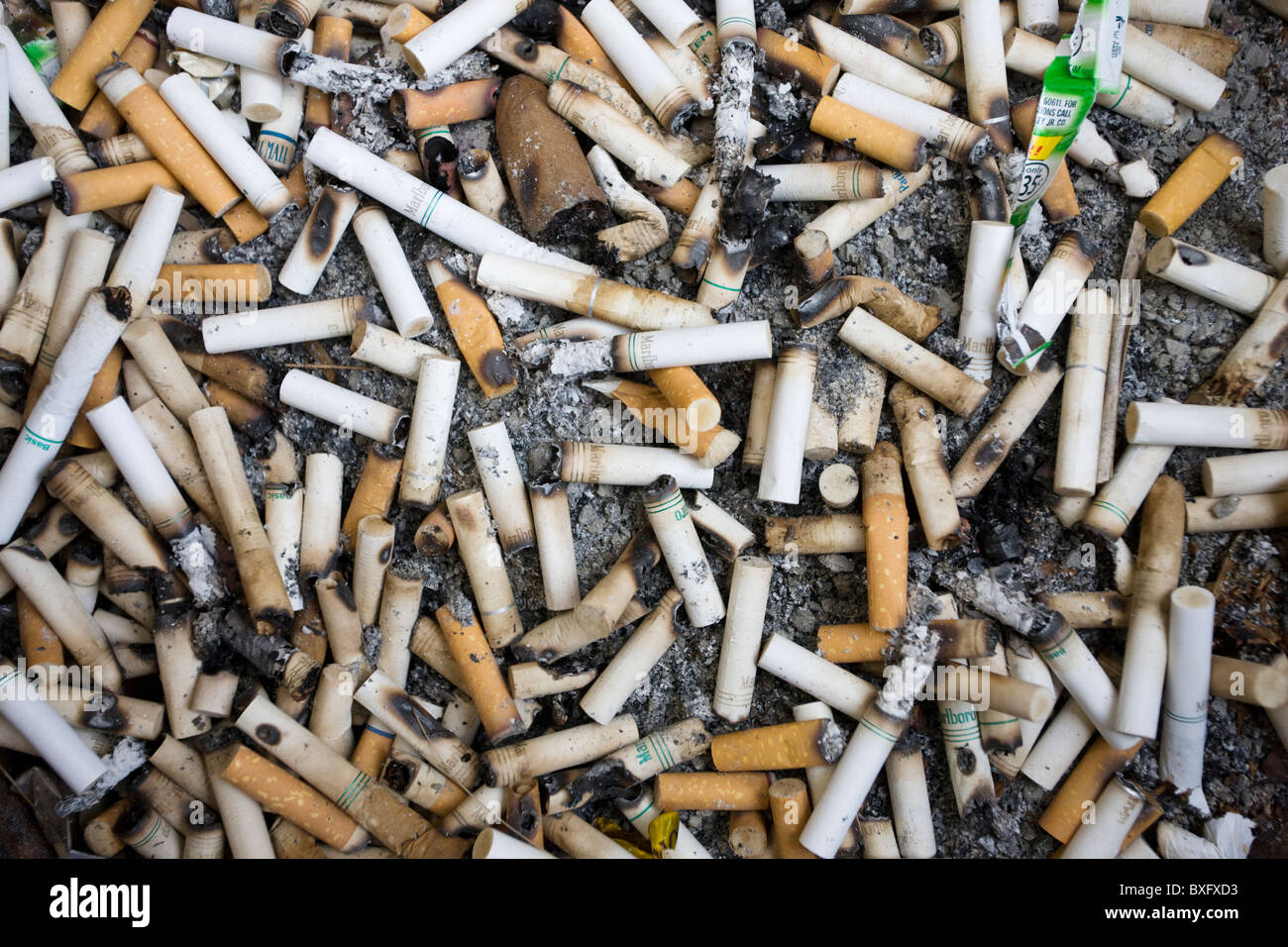 No Smoking rules mean smokers have to discard cigarette and cigar butts