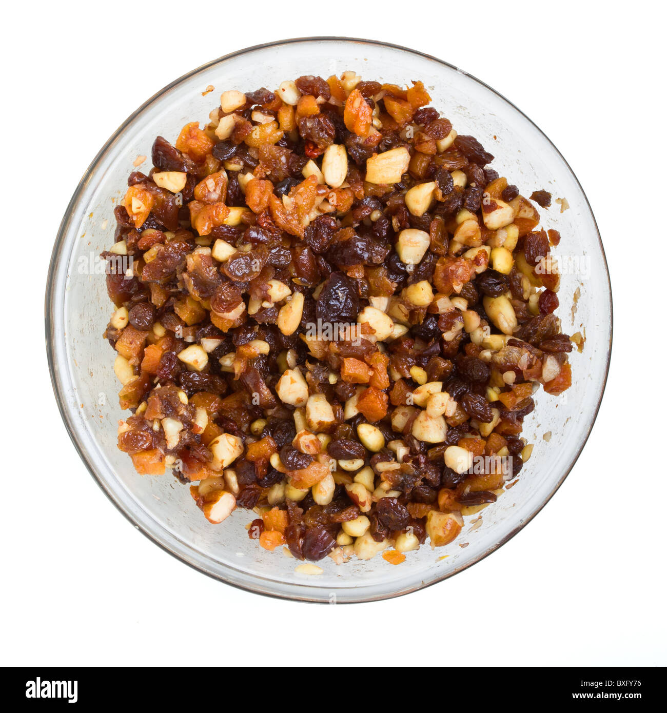 Overhead view of Xmas Cake Mix of nuts and soft fruits soaking up added rum, brandy and sherry. Stock Photo
