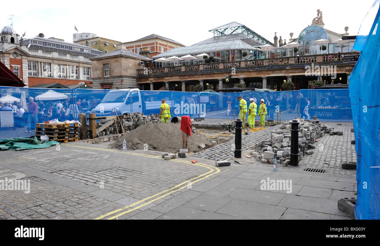 Cobbles lifted up at Covent Garden piazza for repairs works Stock Photo