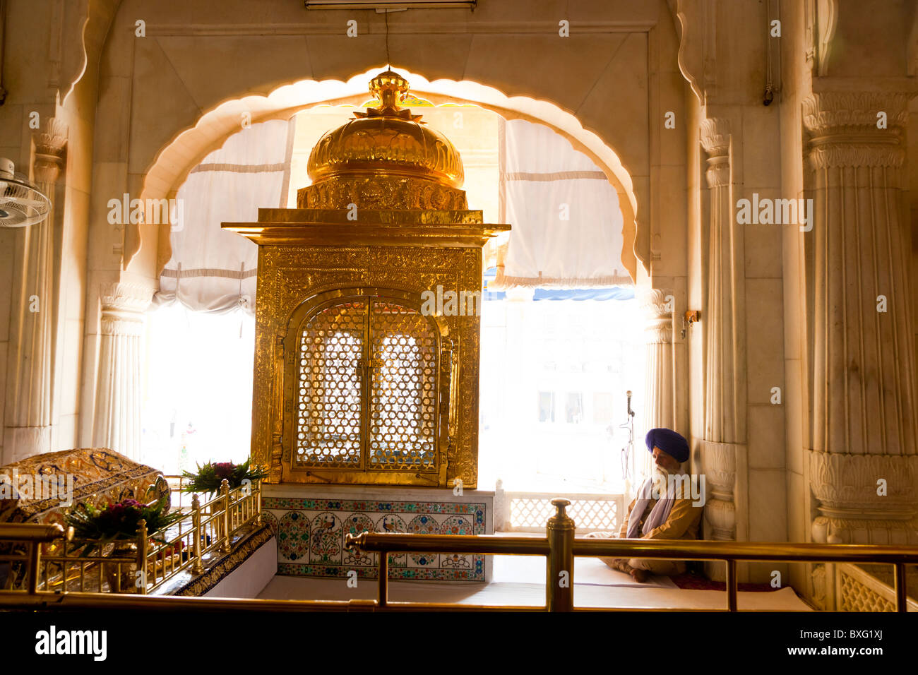 Man Praying Inside The Golden Temple High Resolution Stock Photography ...