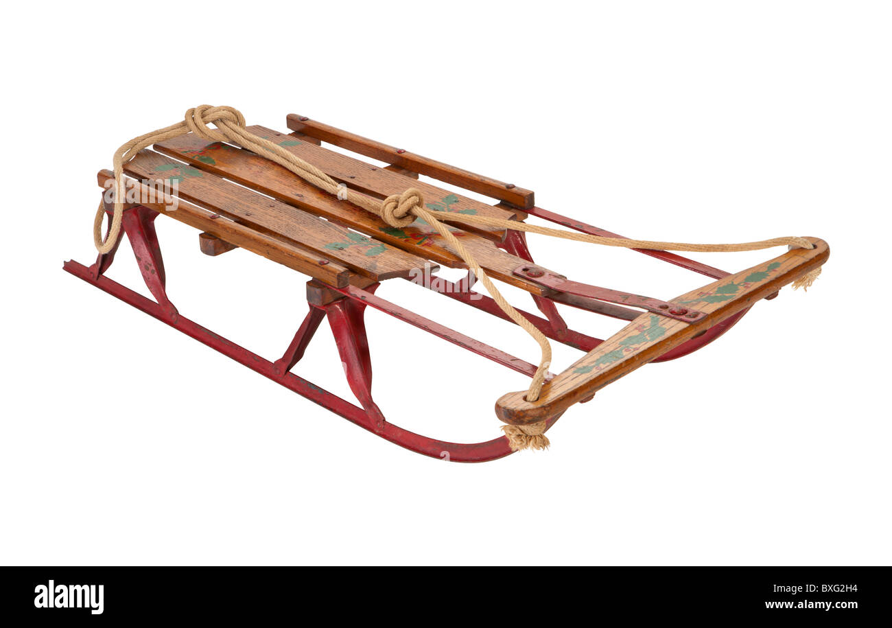 Antique Sled Isolated on a white background. Stock Photo