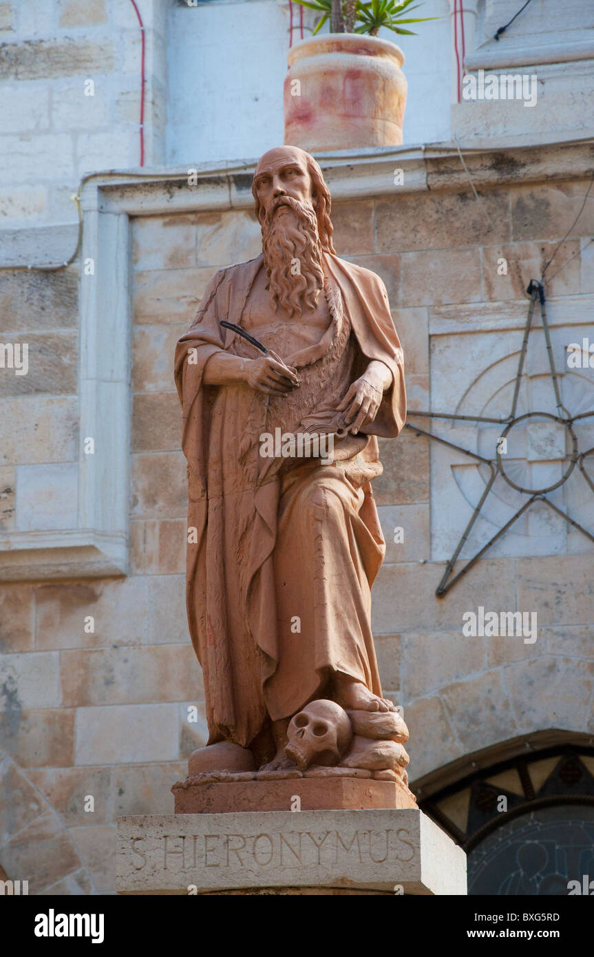 A statue of St. Jerome outside St. Catherine's Church in Bethlehem. Stock Photo