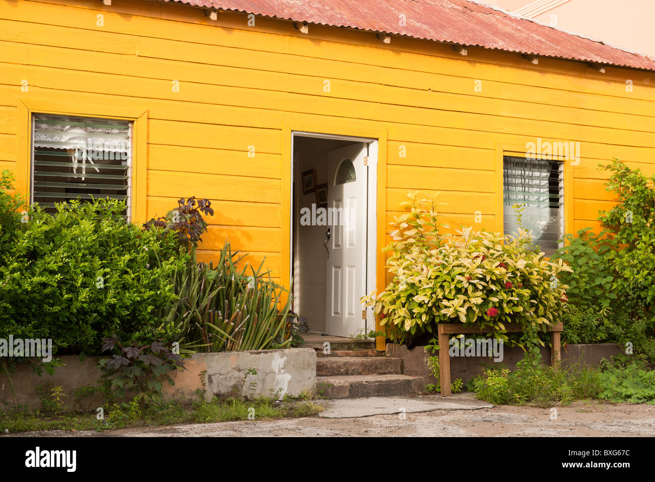 Yellow house with red roof Stock Photo Alamy