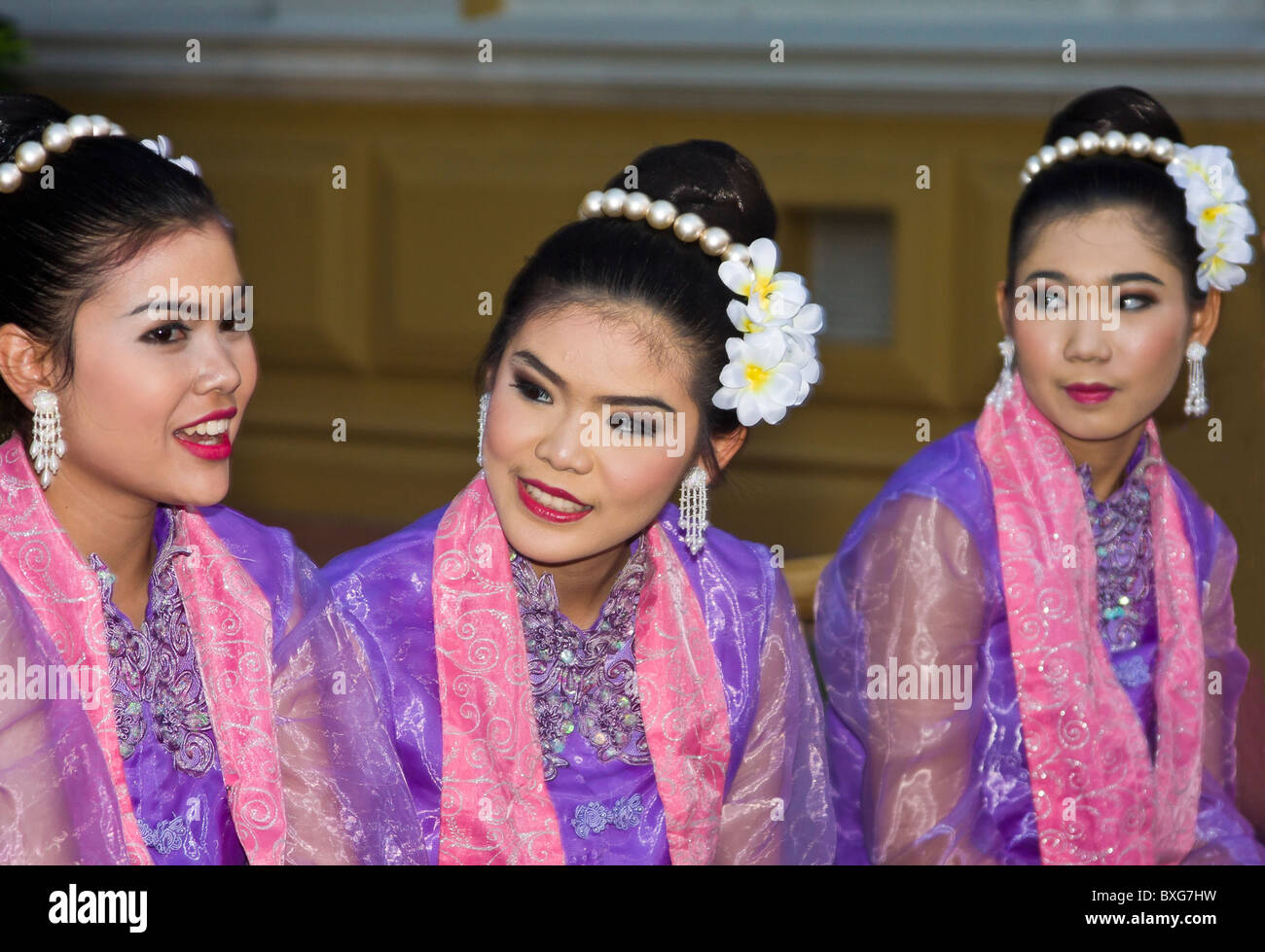 Young Thai women in traditional costume at Thailand Tourism Authority Golden Jubilee Grand Reception; Bangkok, Thailand. Stock Photo