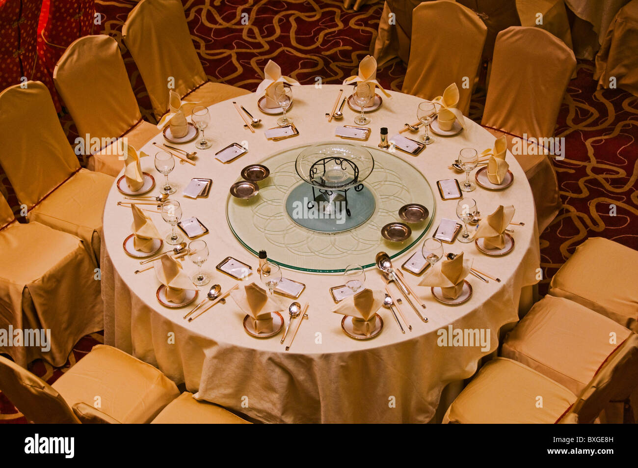 Elaborate round table decoration in hotel dining room Stock Photo Alamy
