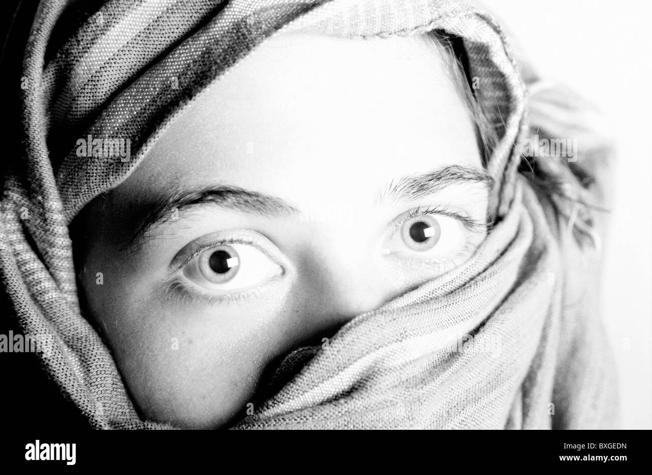 Portrait of a young woman wearing a traditional headscarf Stock Photo ...