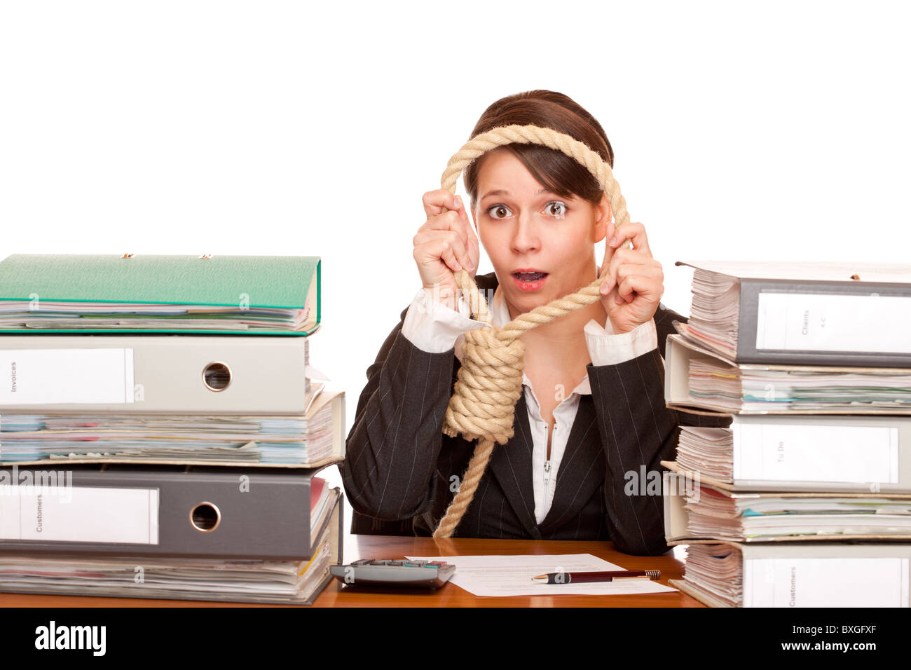 Woman in office is desperated and puts sling around head for suicide.Isolated on white background. Stock Photo
