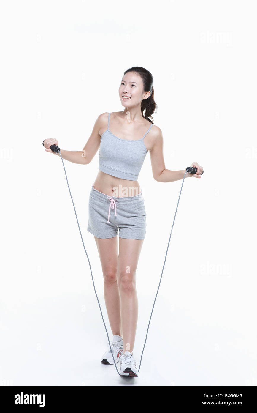 woman is stretching with rope Stock Photo - Alamy
