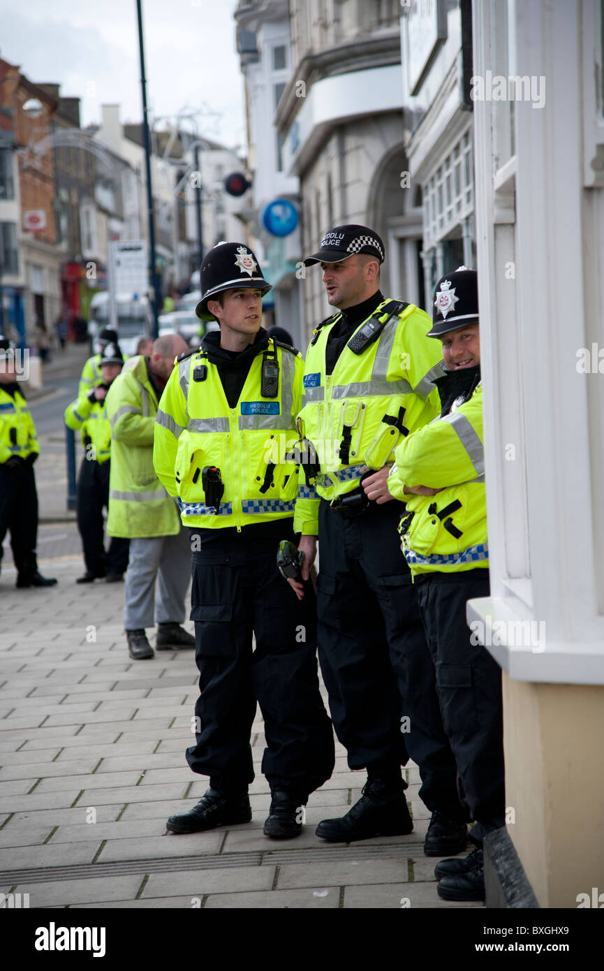 Police officers at student protest against education cuts, Aberystwyth Wales UK Stock Photo