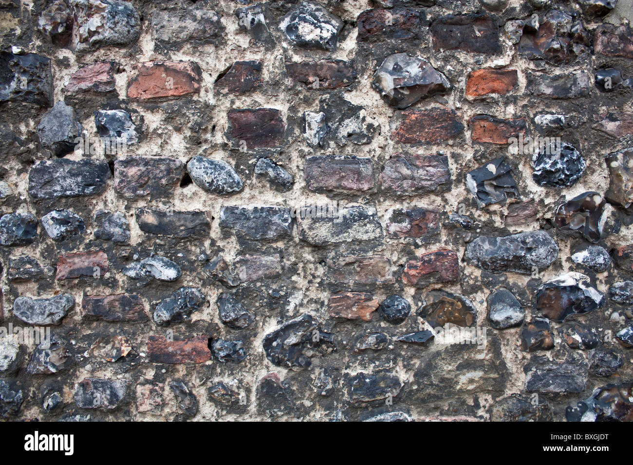 old randomly laid brick and flint wall Stock Photo Alamy