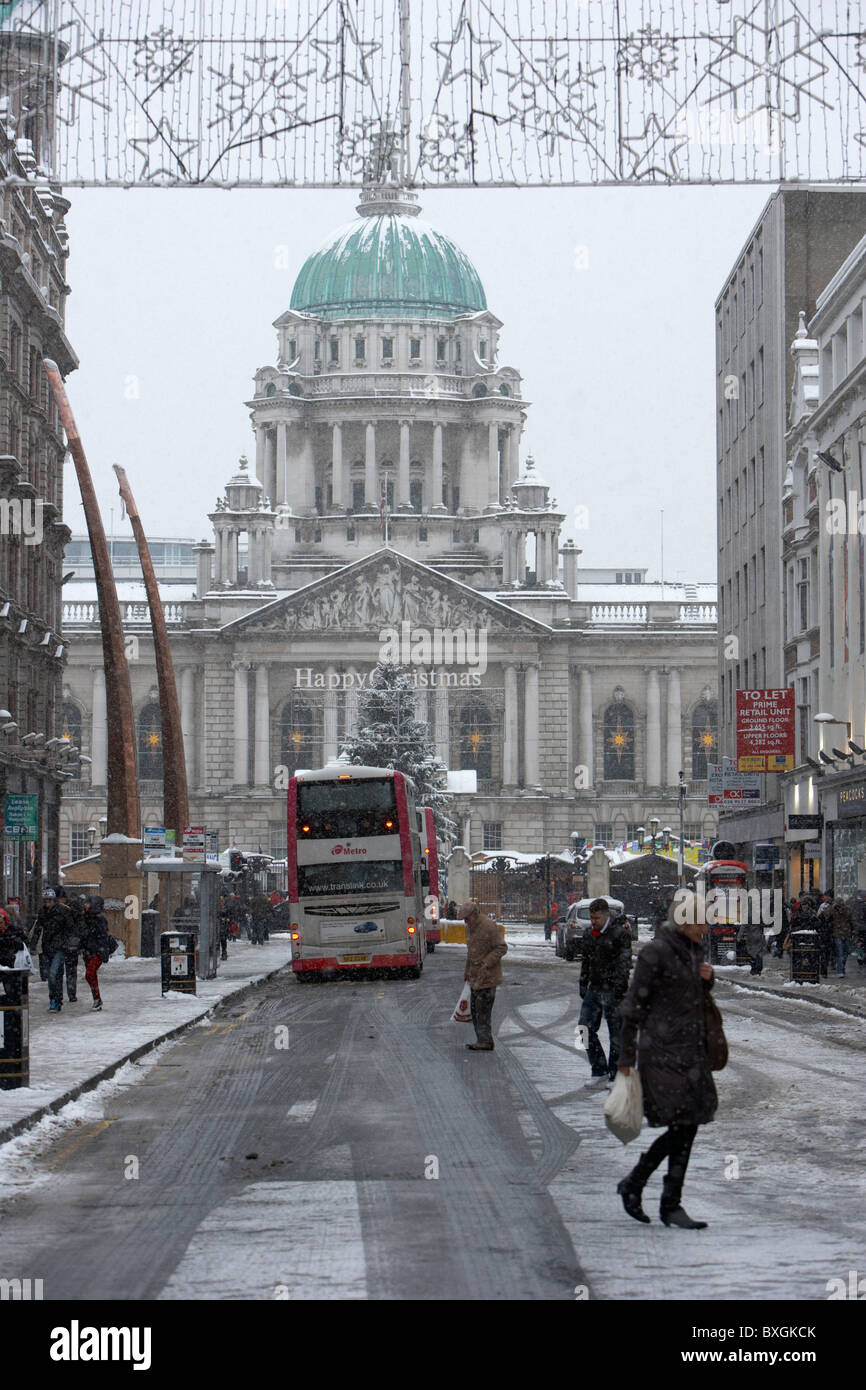 donegal place and belfast city hall on a cold snowy winters day Belfast Northern Ireland Stock Photo