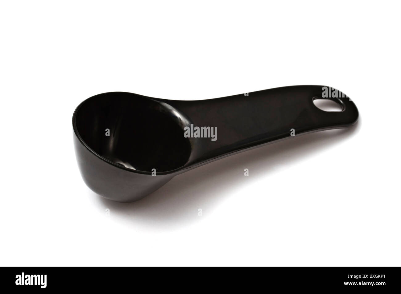 A black plastic coffee scoop isolated on white Stock Photo Alamy