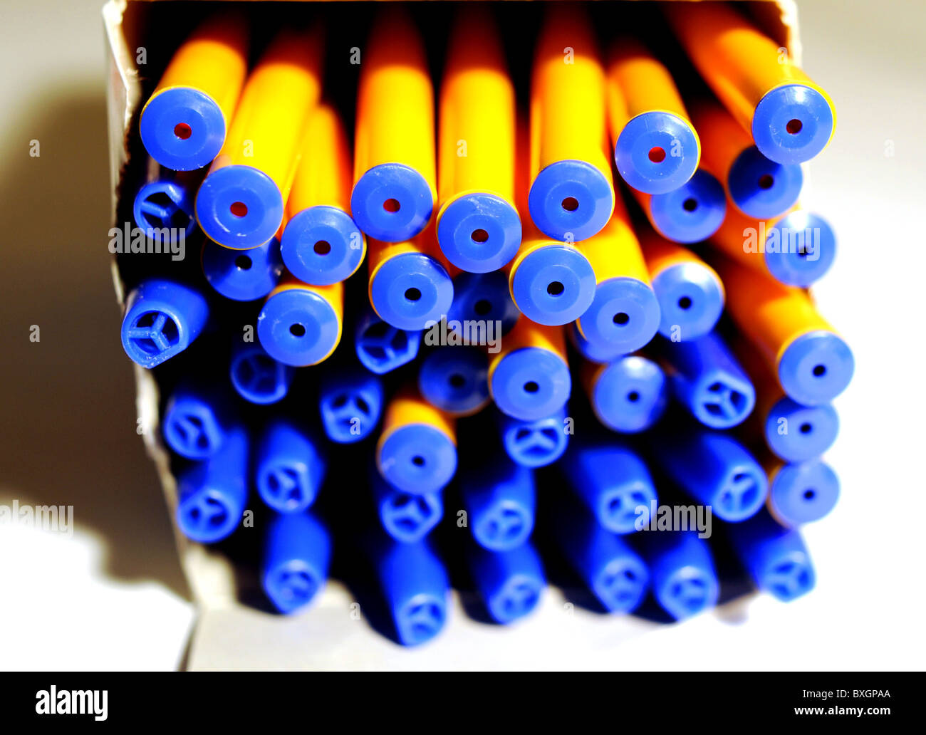 Office stationary and equipment biro pens in blue and yellow Stock Photo