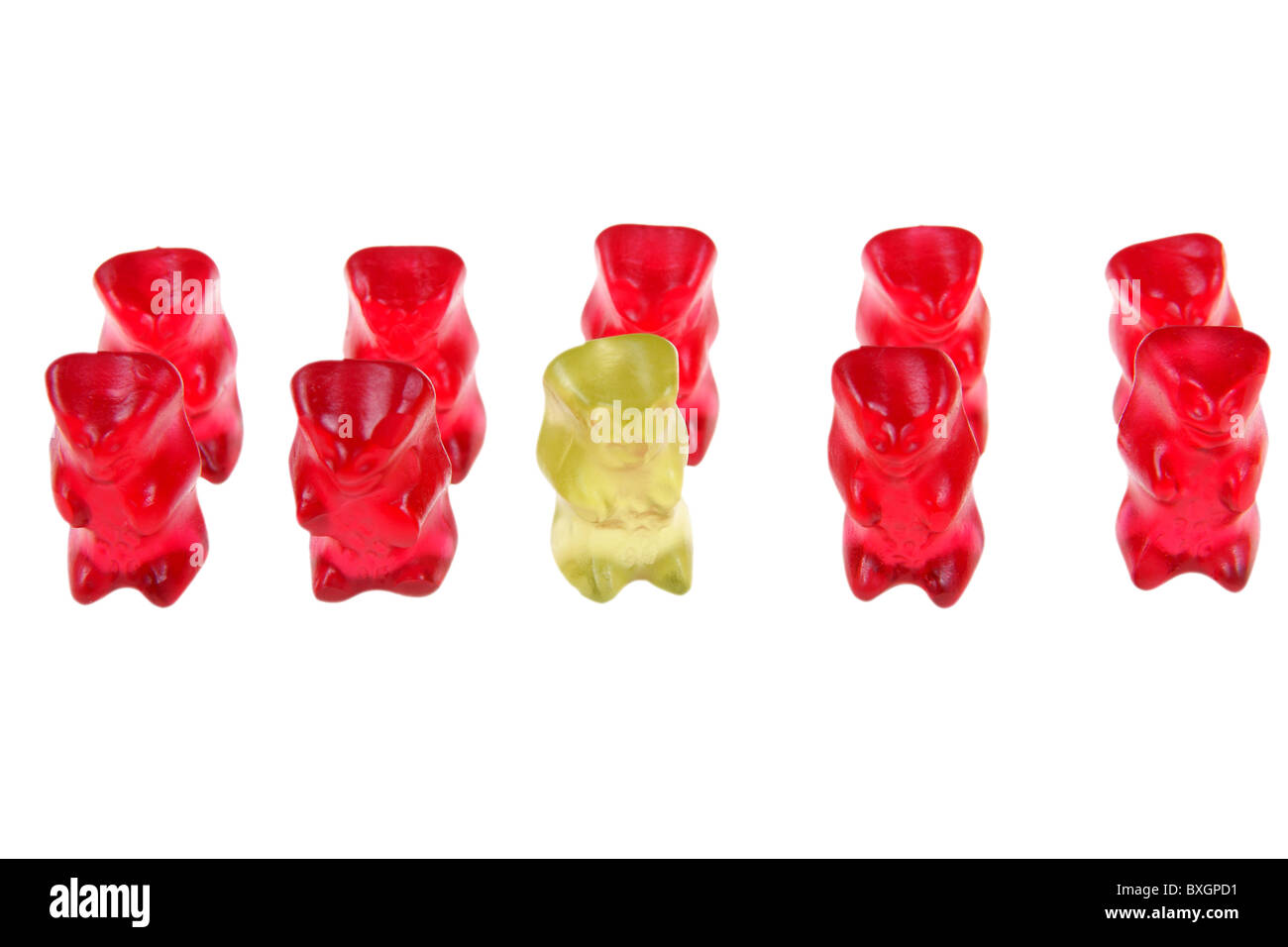 Gummy bears arragment as team isolated on white background Stock Photo