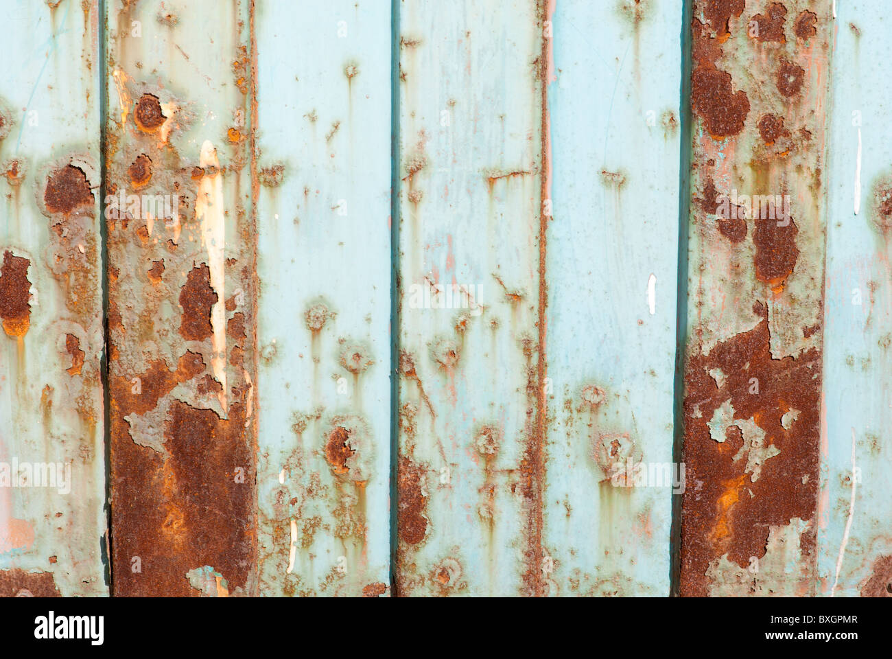 heavily rusted metal fence Stock Photo