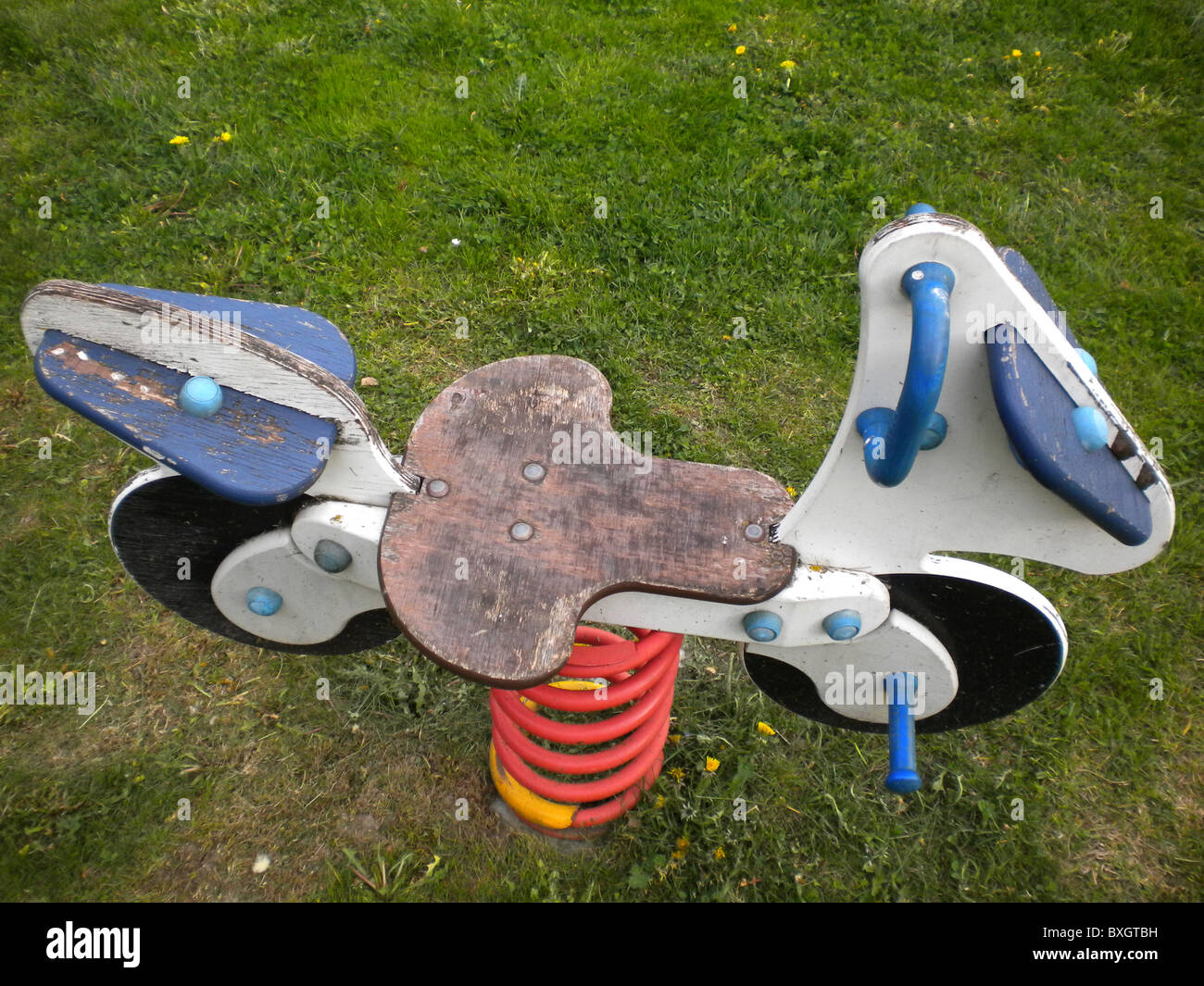 children's play wooden rocking motorcycle with spring-like Stock Photo ...
