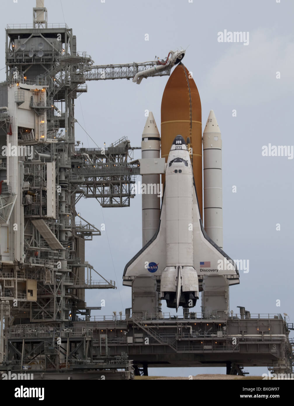 space shuttle Discovery waits patiently on Launch Pad 39A for its STS-133 launch to the International Space Station Stock Photo