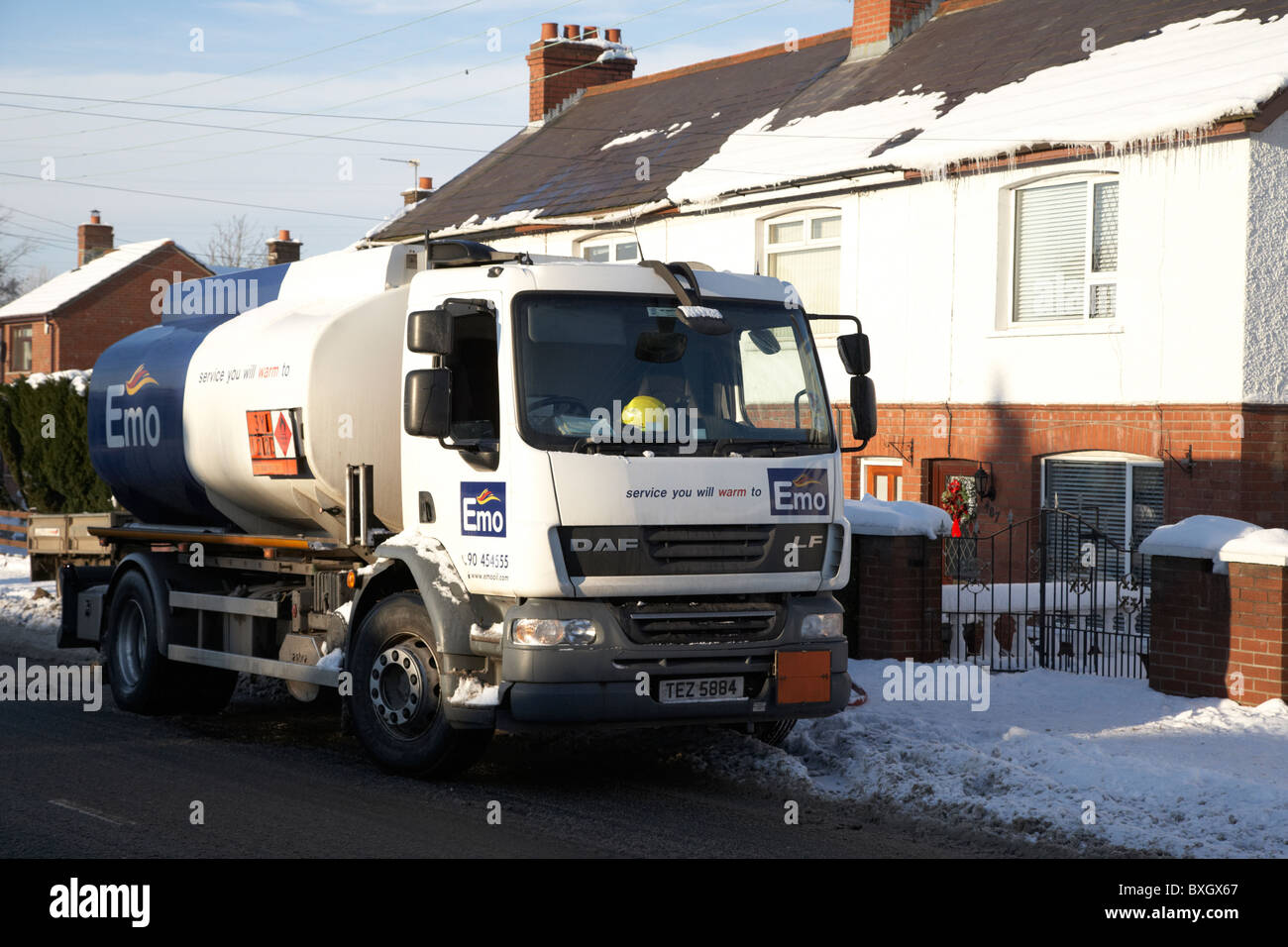 household home heating oil delivery in snow on a cold snowy winters day Northern Ireland Stock Photo