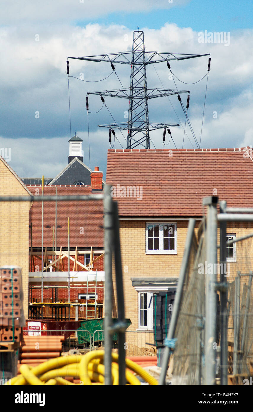 Pylons near housing development under construction Colchester Essex UK Stock Photo Alamy