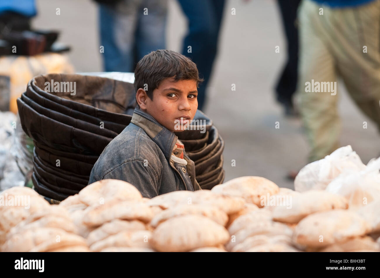 Egypt, Cairo. Bread vendor in the Khan el-khalili market Cairo. Stock Photo