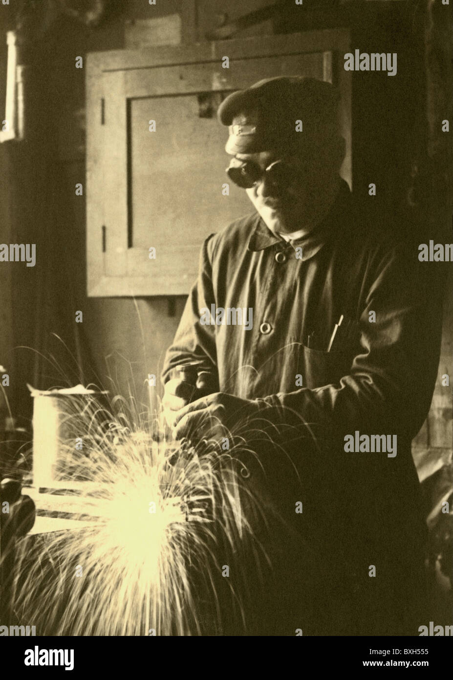 people, profession, metal worker, welder, Bamag Meguin AG, Berlin Stock