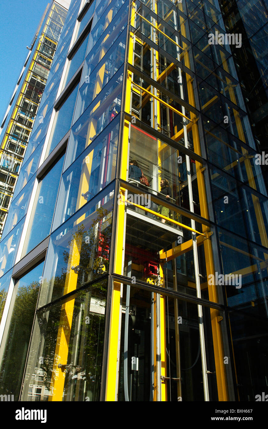 Glass lifts at 'Waterside'  designed by Richard Rogers Partnership and houses the headquarters of Marks & Spencer. Stock Photo
