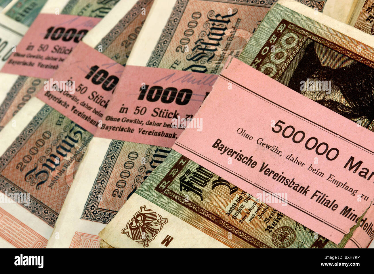 money / finance,bank notes,Germany,inflation money,December 1922 until February 1923,historic,historical,1920s,20s,20th century,numismatics,pack,bunch,revenue stamp,revenue stamps,banderole,Bavarian Vereinsbank,Reichsbank,branch office Mindelheim,banknote,bank note,bill ,bank notes,bale,bail,to bunch,baling,bailing,bunching,baled,bailed,bunched,500000,hyper inflation,credit crunch,rag money,Mark,political economy,national economy,purchasing power,buying power,increase of purchasing power,economic situation,economic flu,Additional-Rights-Clearences-Not Available Stock Photo