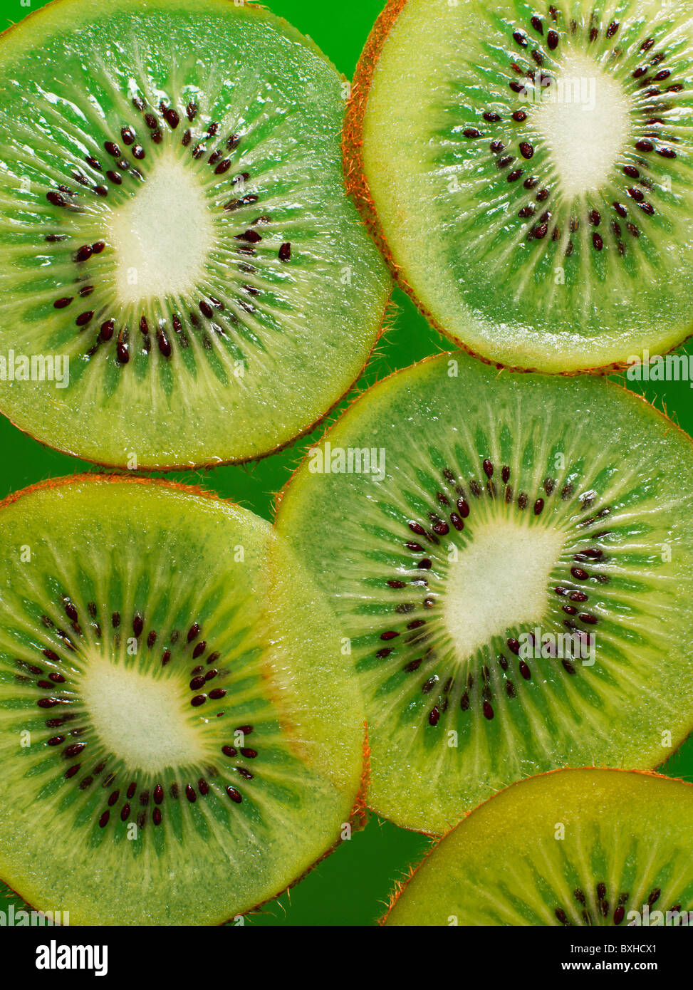 Kiwis fruits green cut sliced half