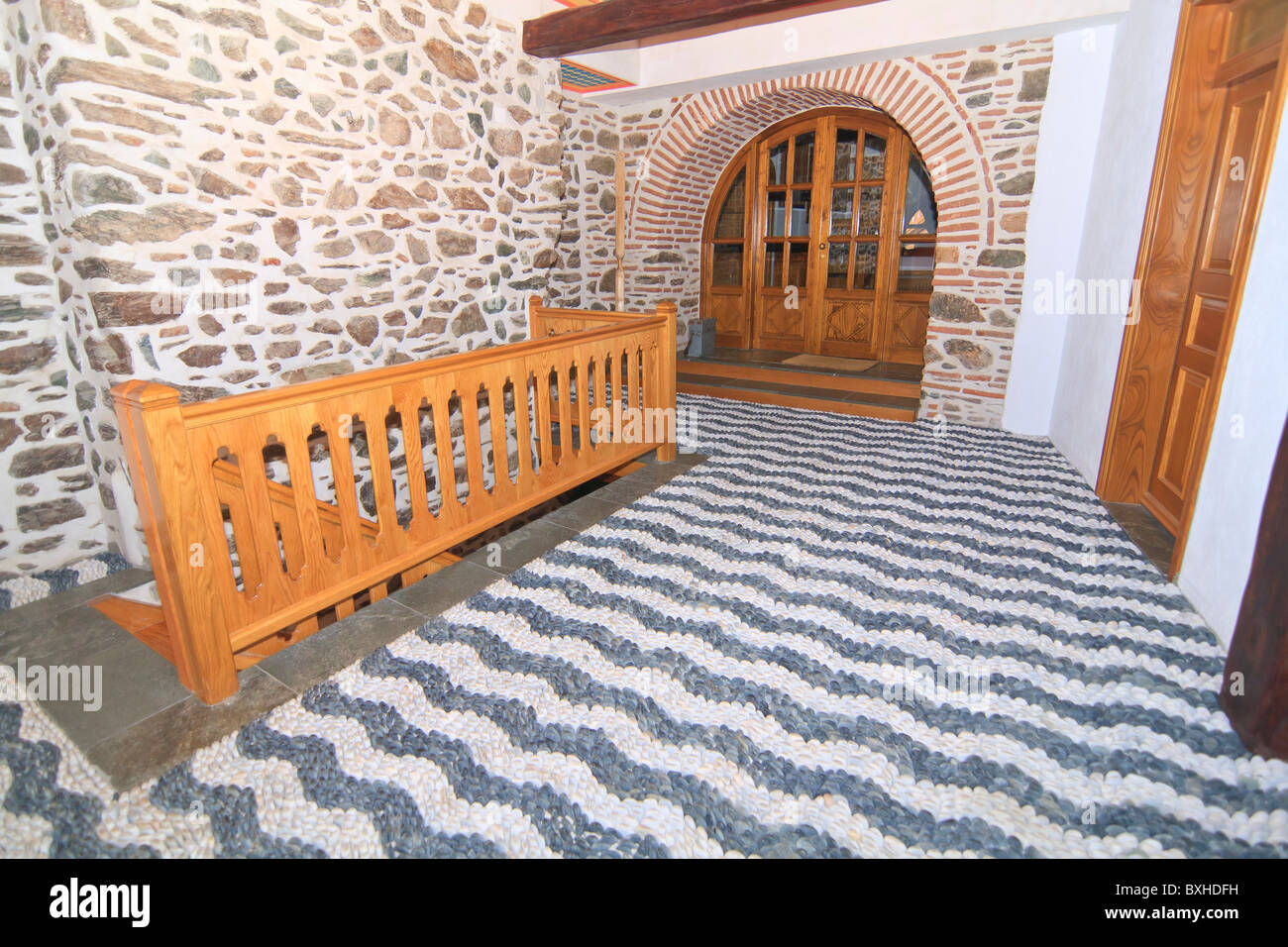 Typical internal cobblestone decorations inside monastery Stock Photo