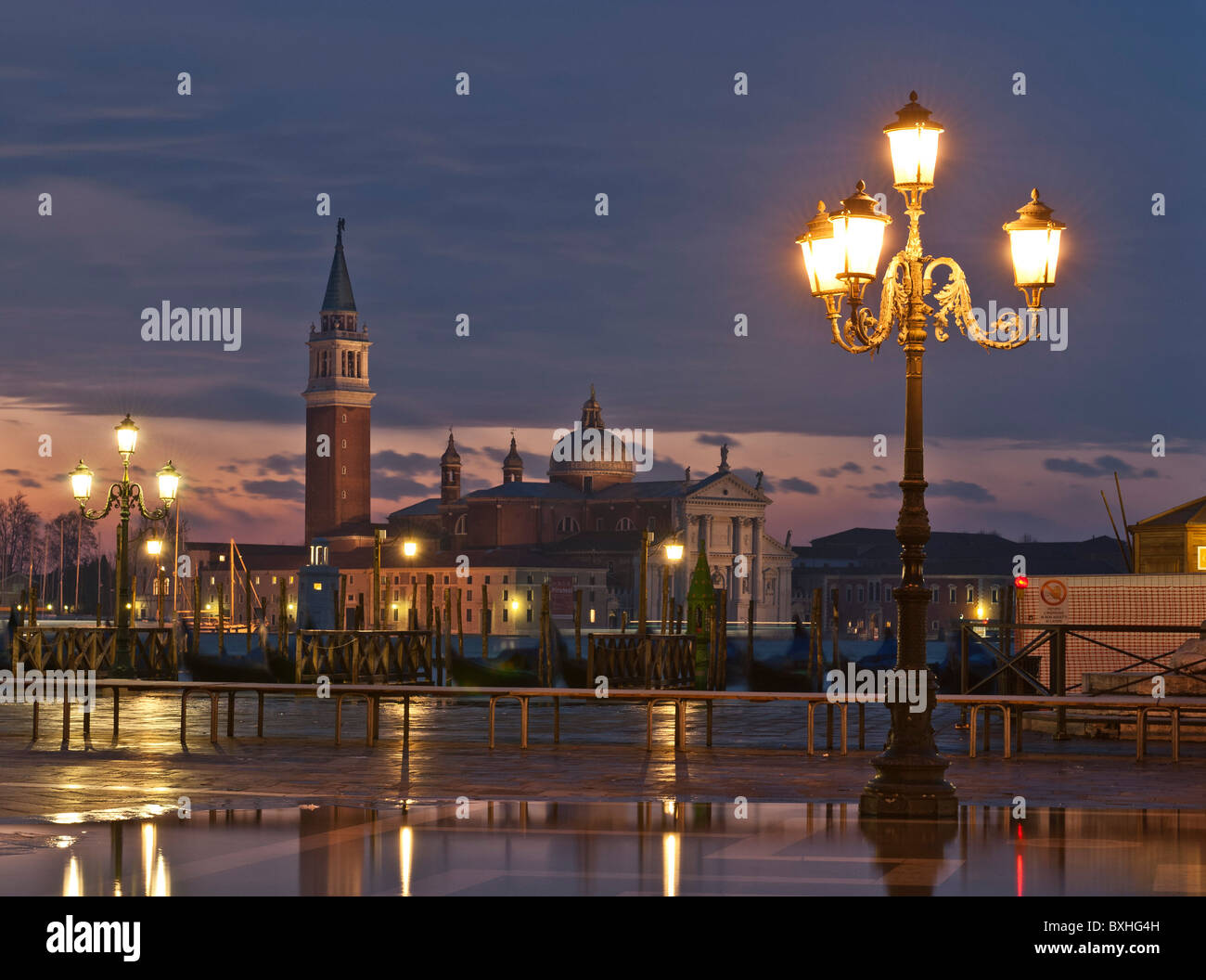 View of Lido island and gondolas at sunrise, Venice, Italy, Europe Stock Photo