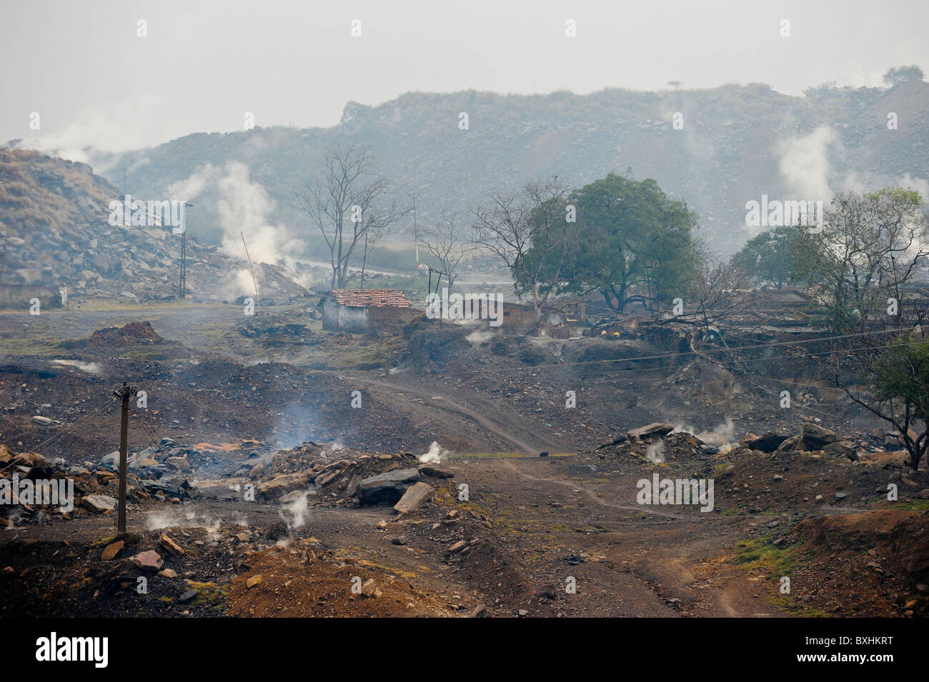 India Jharkhand Jharia , burning opencast hard coal mines of BCCL Bharat coking coal Ltd., remains of a village Stock Photo