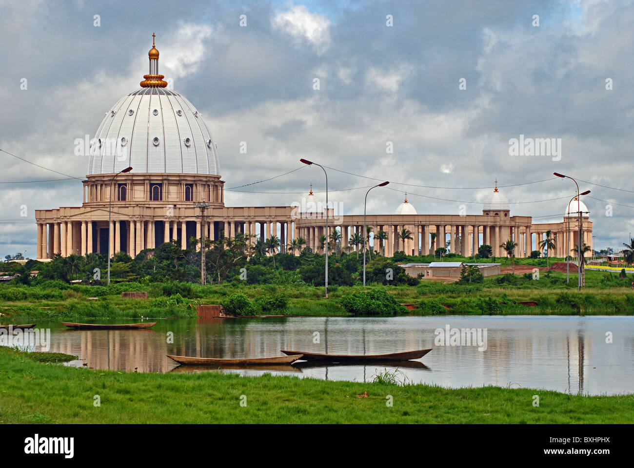 Basilique de Notre Dame, by lake and pirogues, Yammoussoukro, Ivory Coast, West Africa Stock Photo
