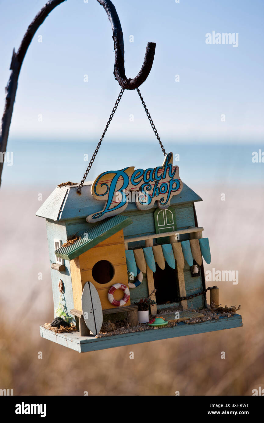 Hanging bird feeder beach shop at beachfront holiday home, Anna Maria Island, Florida Stock Photo