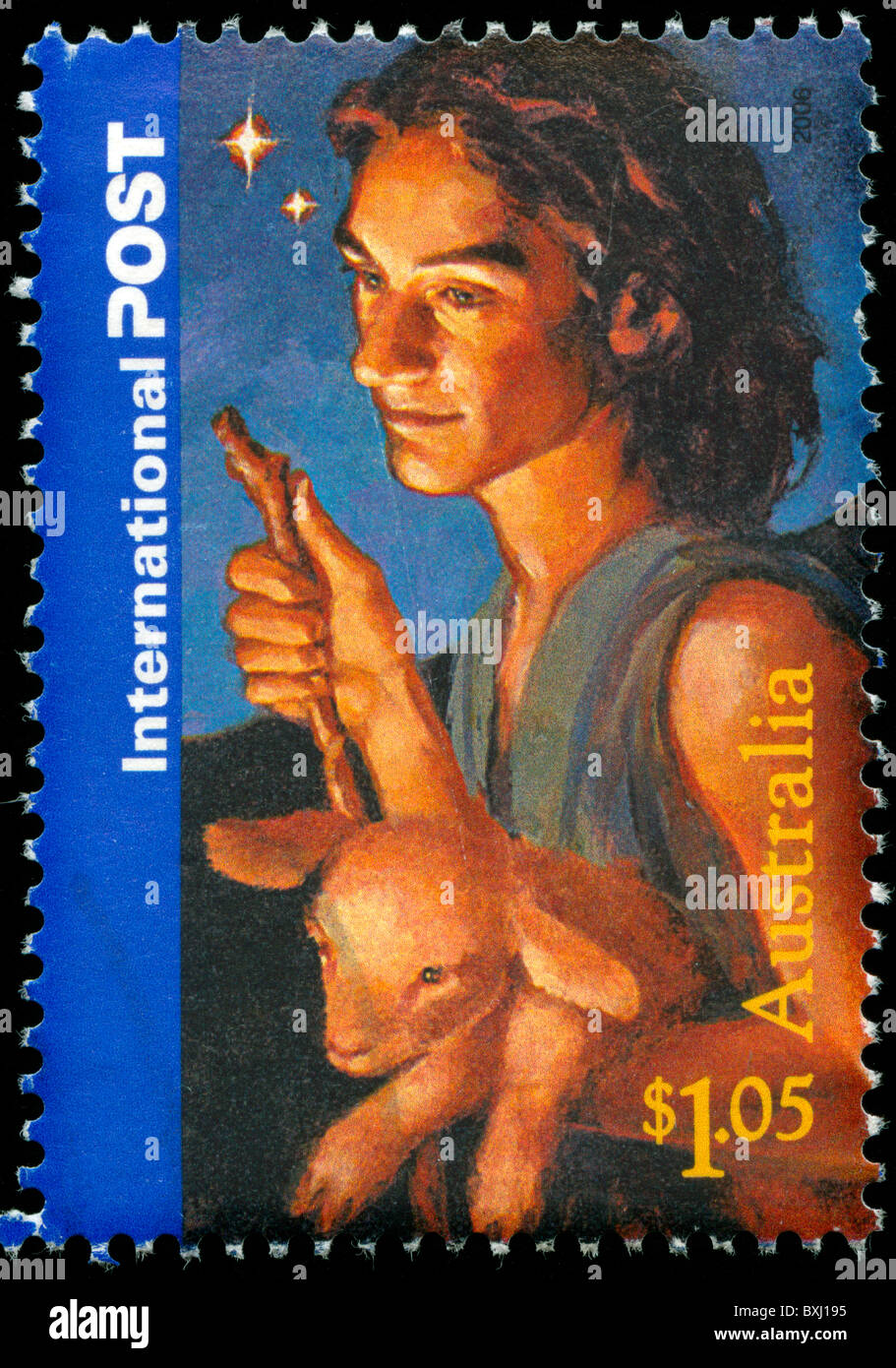 Christmas stamp from Australia with picture of a shepherd holding a