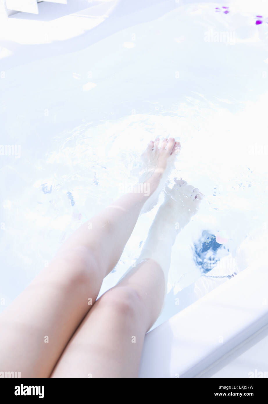 Woman's leg taking a bath, closeup Stock Photo Alamy