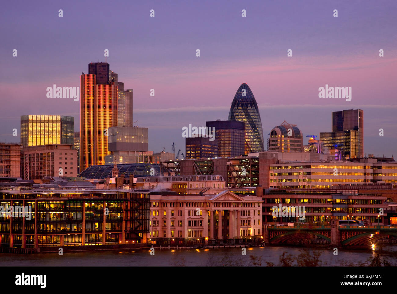 twilight skyline of city financial district square mile London England Stock Photo