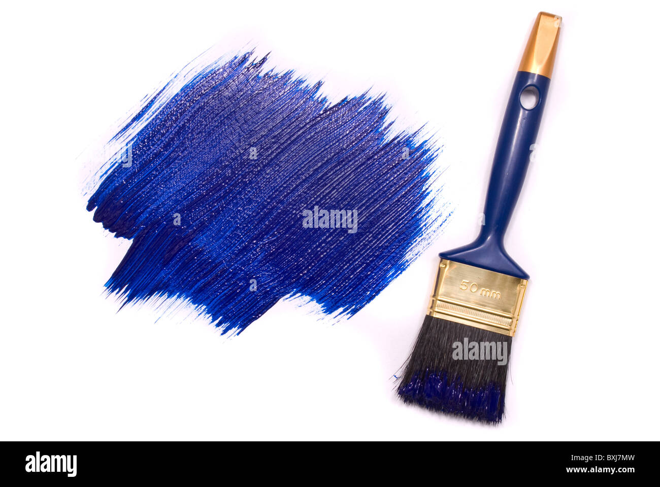 Professional brush with blue paint on a white background Stock Photo