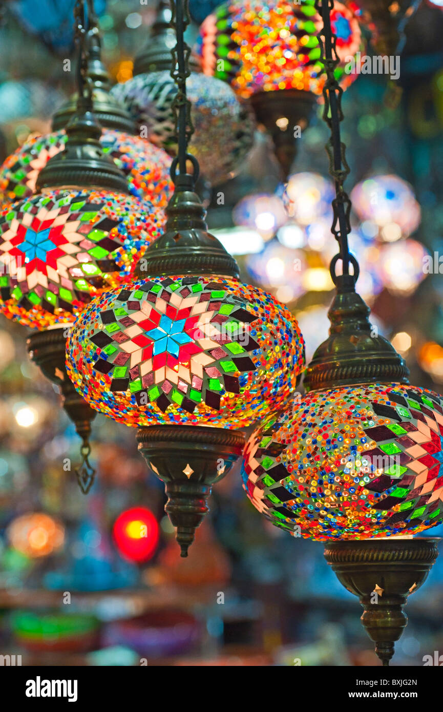 Ornate hanging glass lights at a stall in a market souk Stock Photo