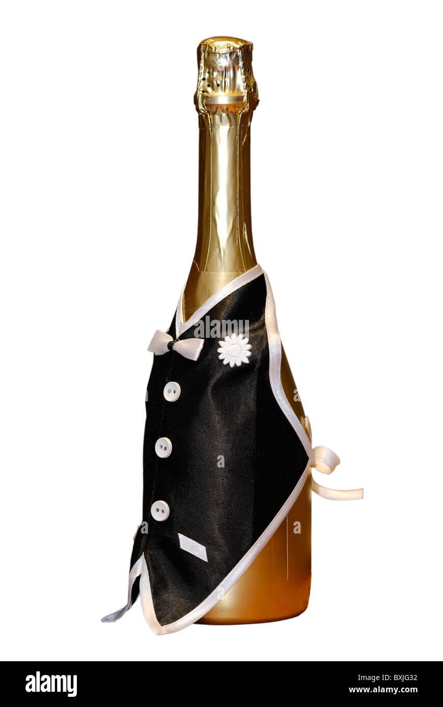 golden bottle of champagne dressed in black waiter's waistcoat isolated on white background Stock Photo
