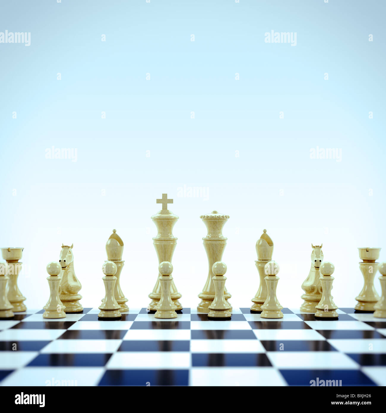 White chess pieces on chess board Stock Photo