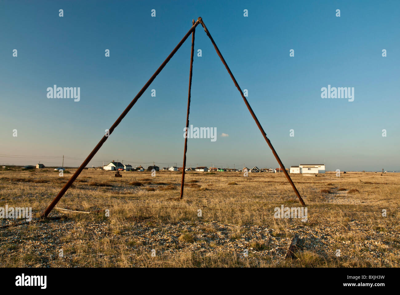 Pyramid of metal poles Dungeness shingle Beach Kent England UK Stock Photo