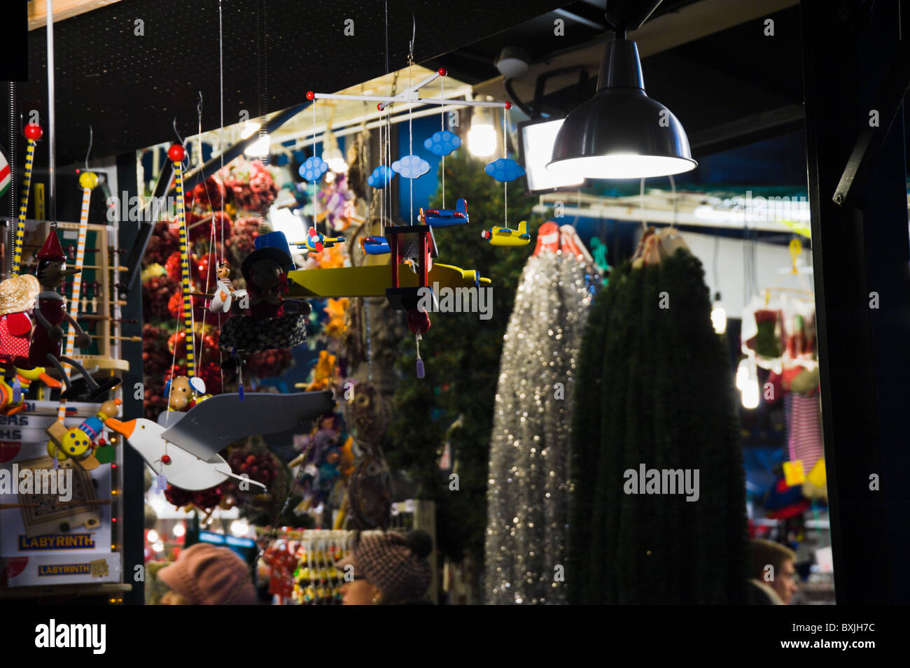Night photo of Christmas decorations and wooden toys at piazza Navona