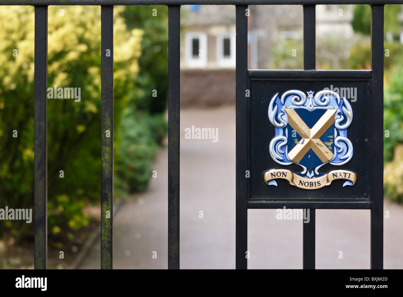 Coat of Arms on iron gates at St Albans School with motto Non Nobis