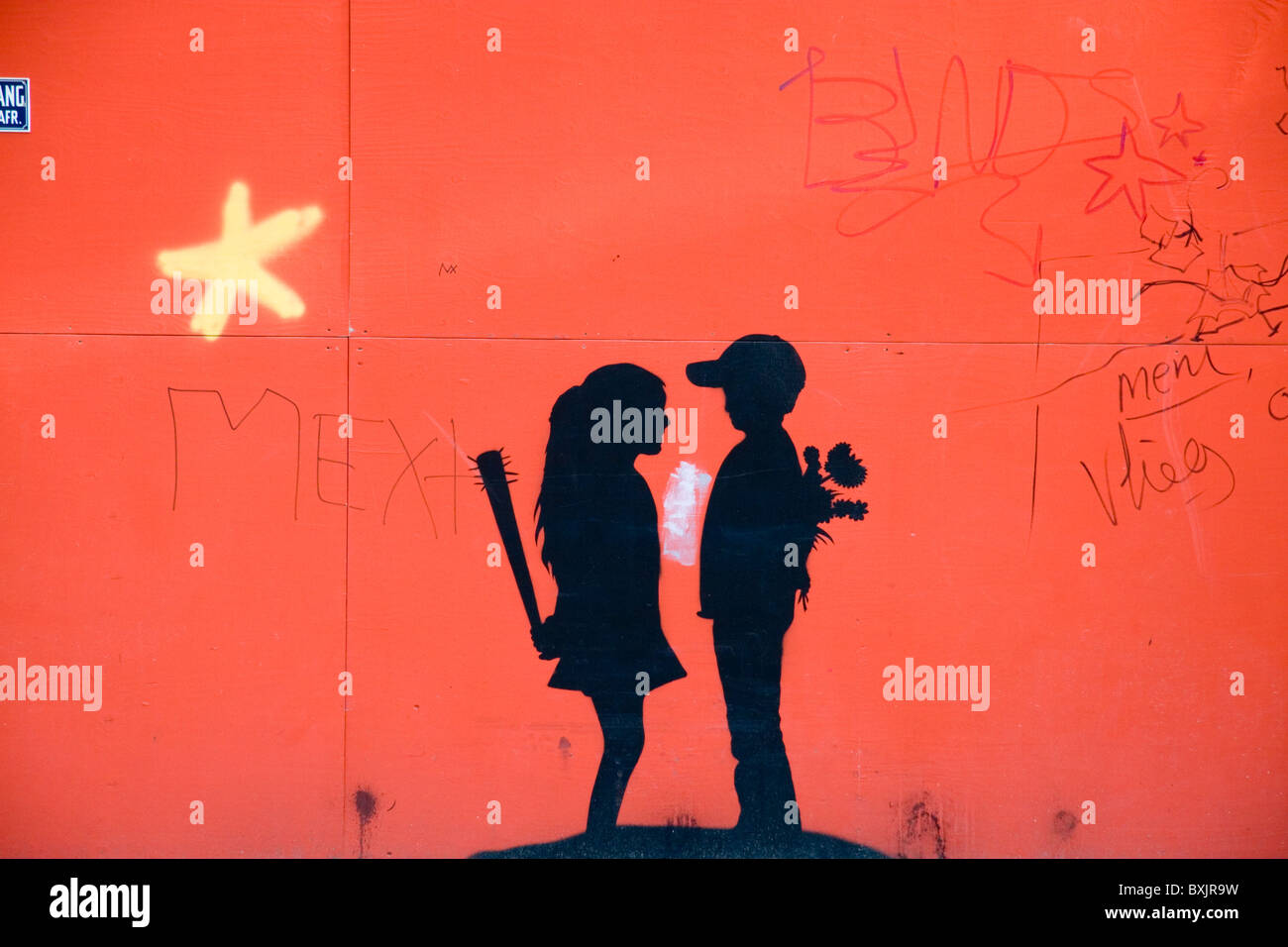 'Love and Hate' graffito mural on a builders hoarding, Amsterdam, Netherlands. Stock Photo