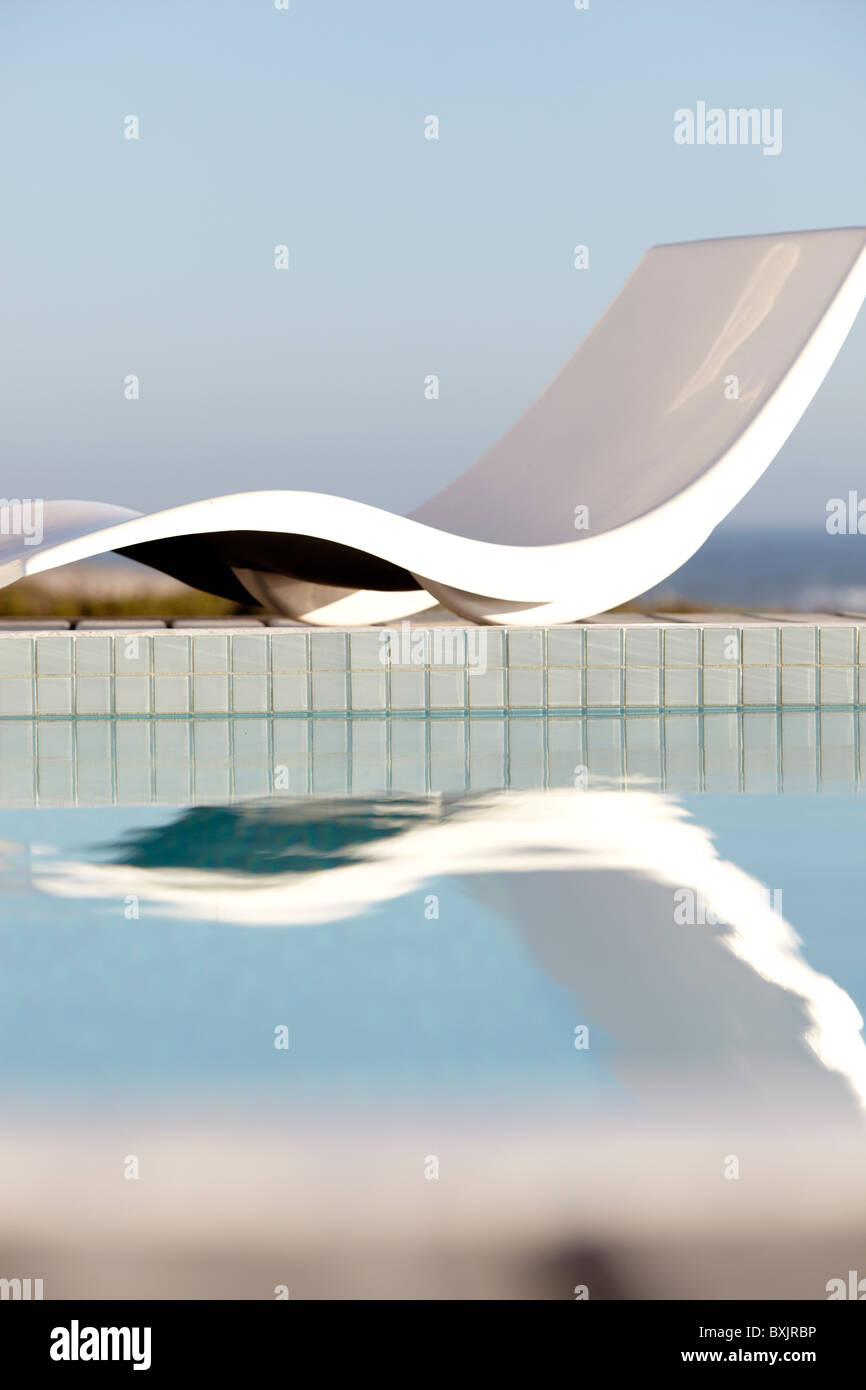 Abstract sun lounger by the pool side Stock Photo