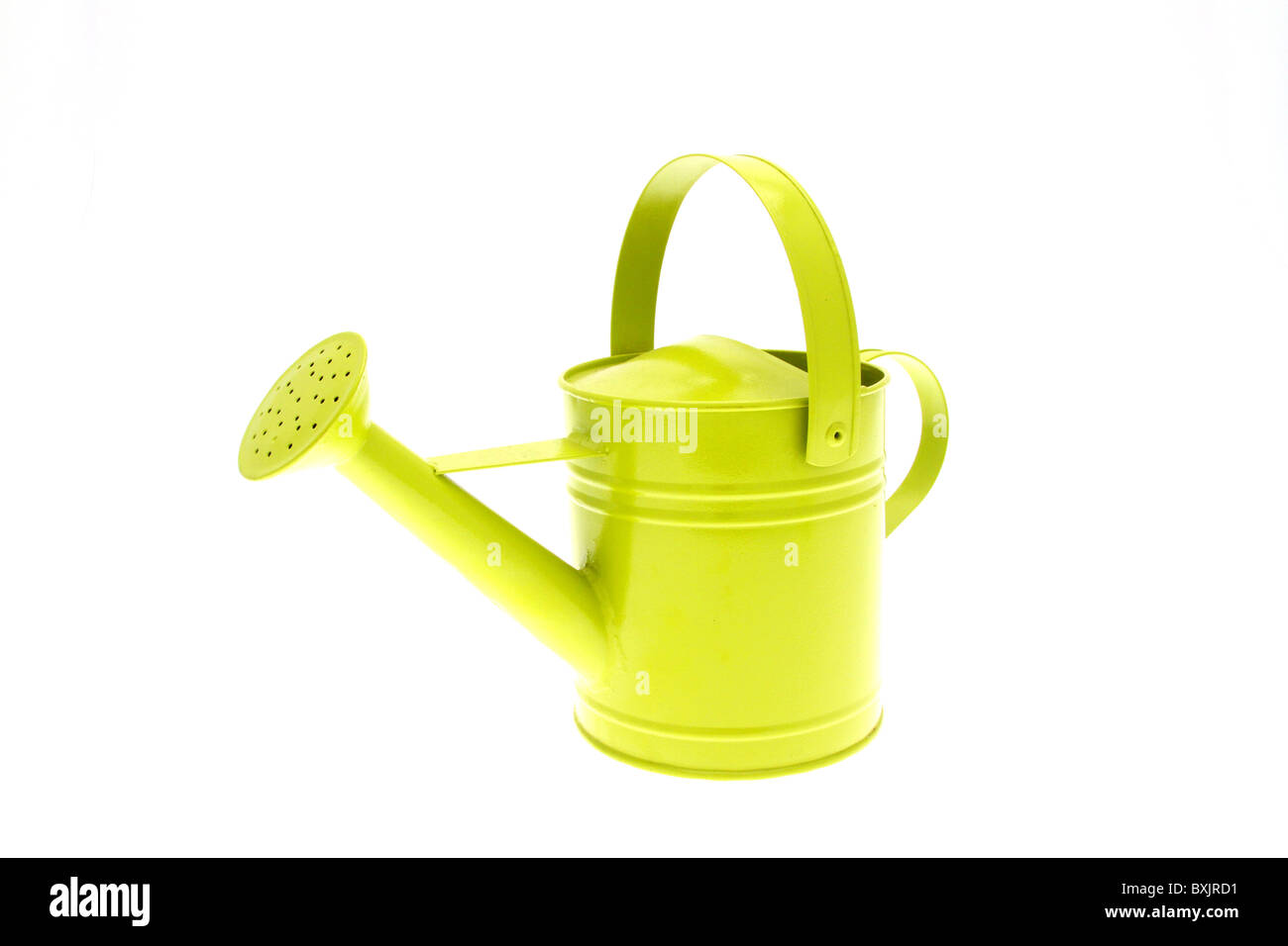 High key image of a green watering can against a white background Stock Photo