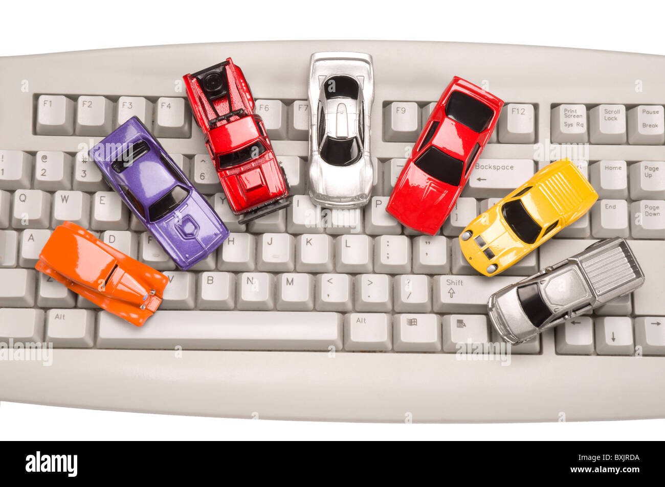 Model cars on a computer keyboard Stock Photo Alamy