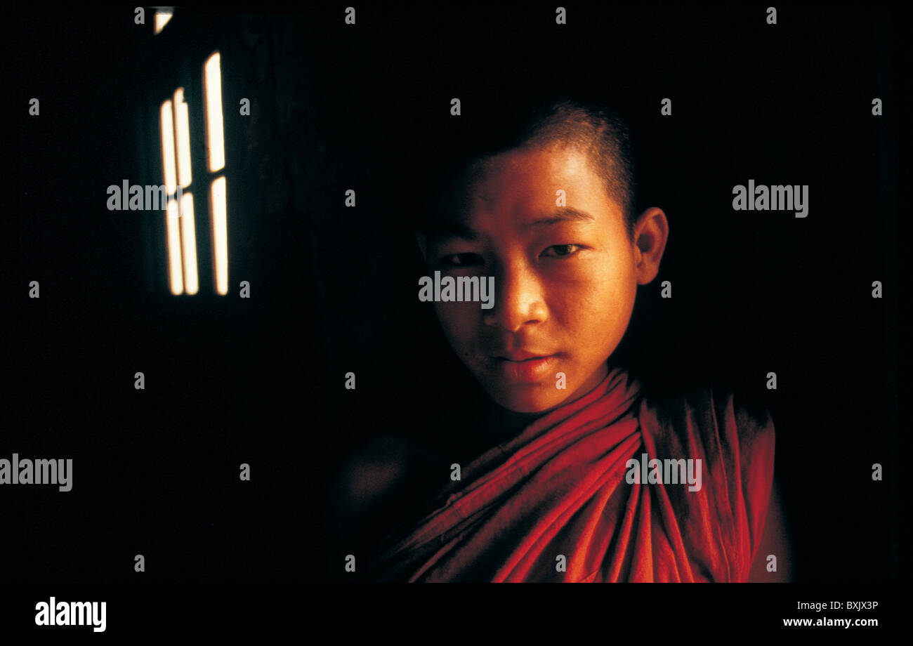 BOY IN SHADOW, BURMA Stock Photo