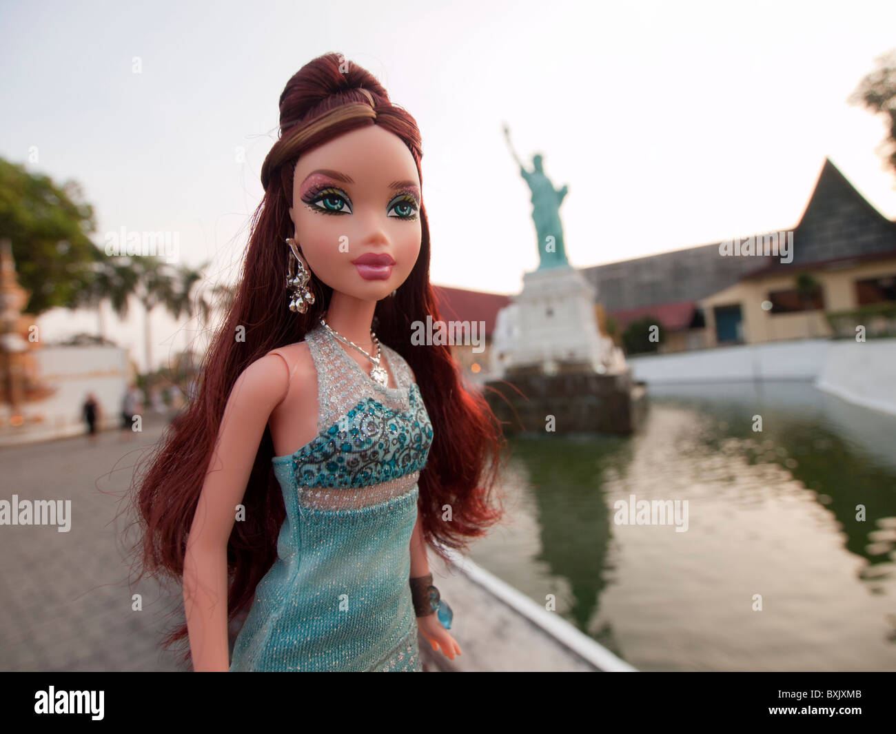 A barbie doll shot next to mini statue of liberty at mini siam pattaya, Thailand. Stock Photo