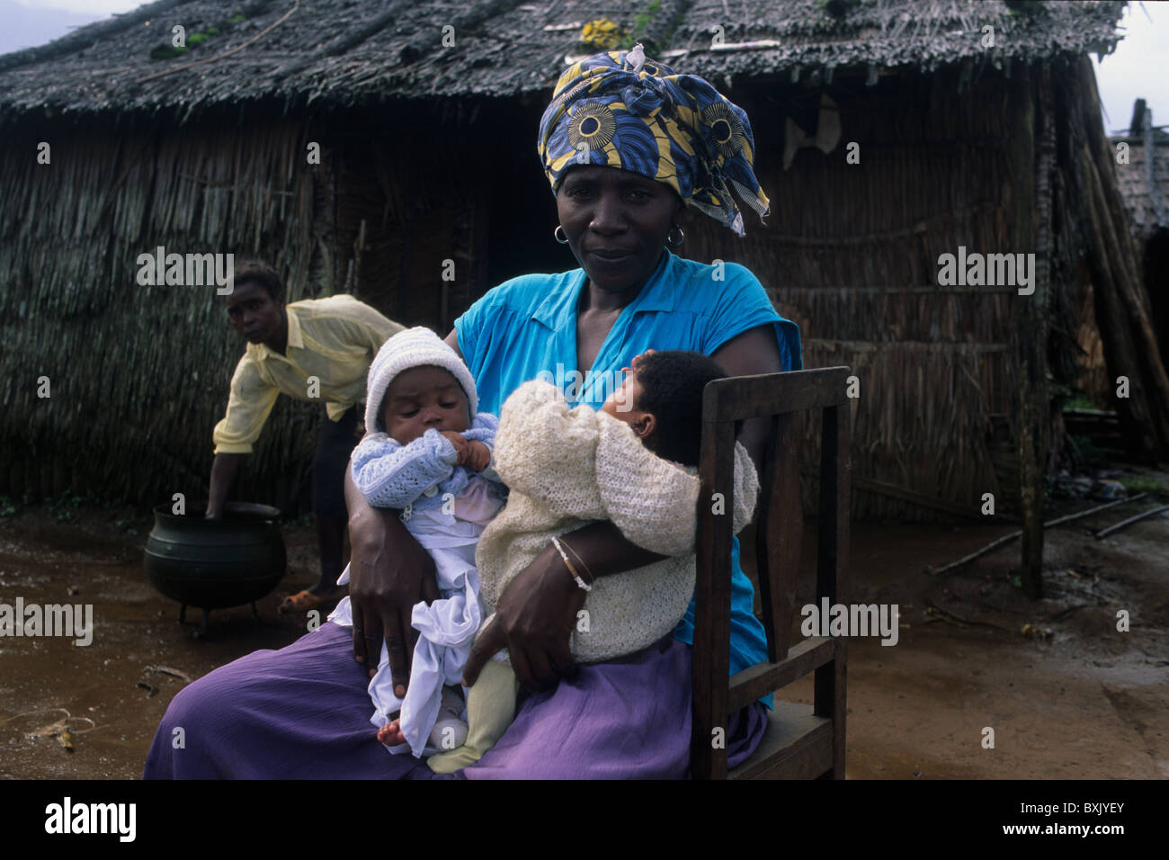 Bubi women with babies on their doorstep MOCA South Bioko Island  EQUATORIAL GUINEA Stock Photo